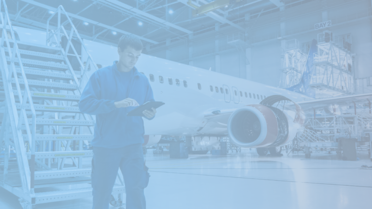 An aerospace manufacturing employee conducting tests to ensure safety