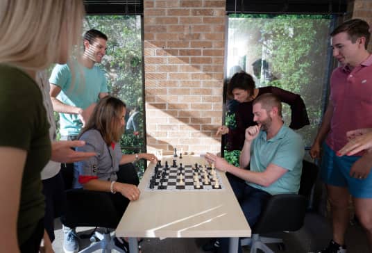 LeanDNA employees playing chess